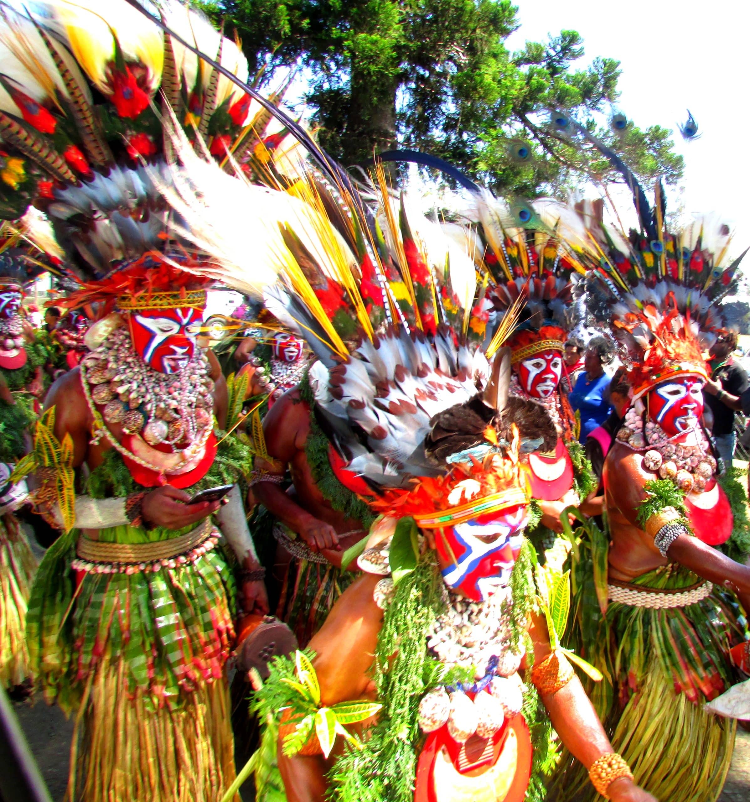 Local communities in Papua New Guinea wearing traditional headdresses. Picture credits: Miriam Supuma